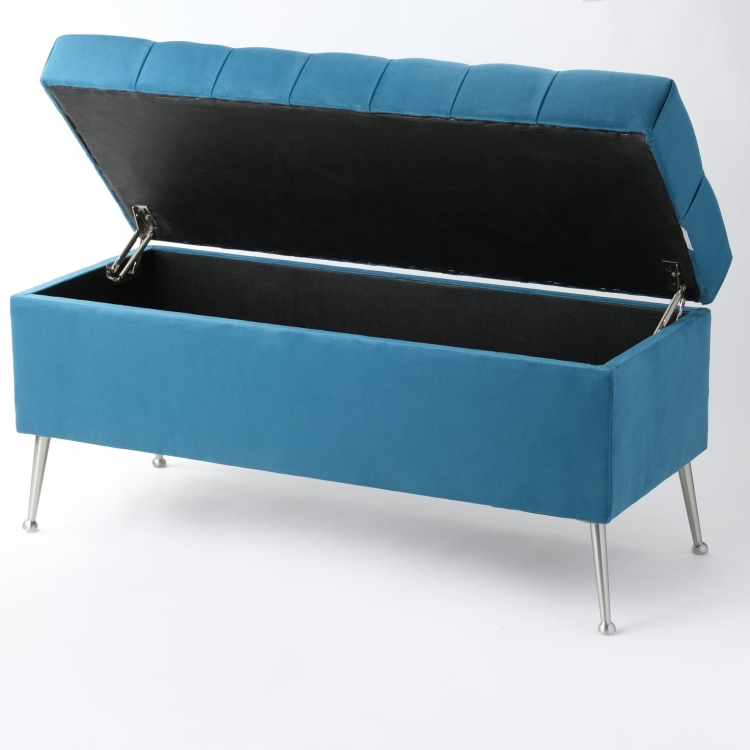Stylish quilted pouf with storage in blue on slender legs