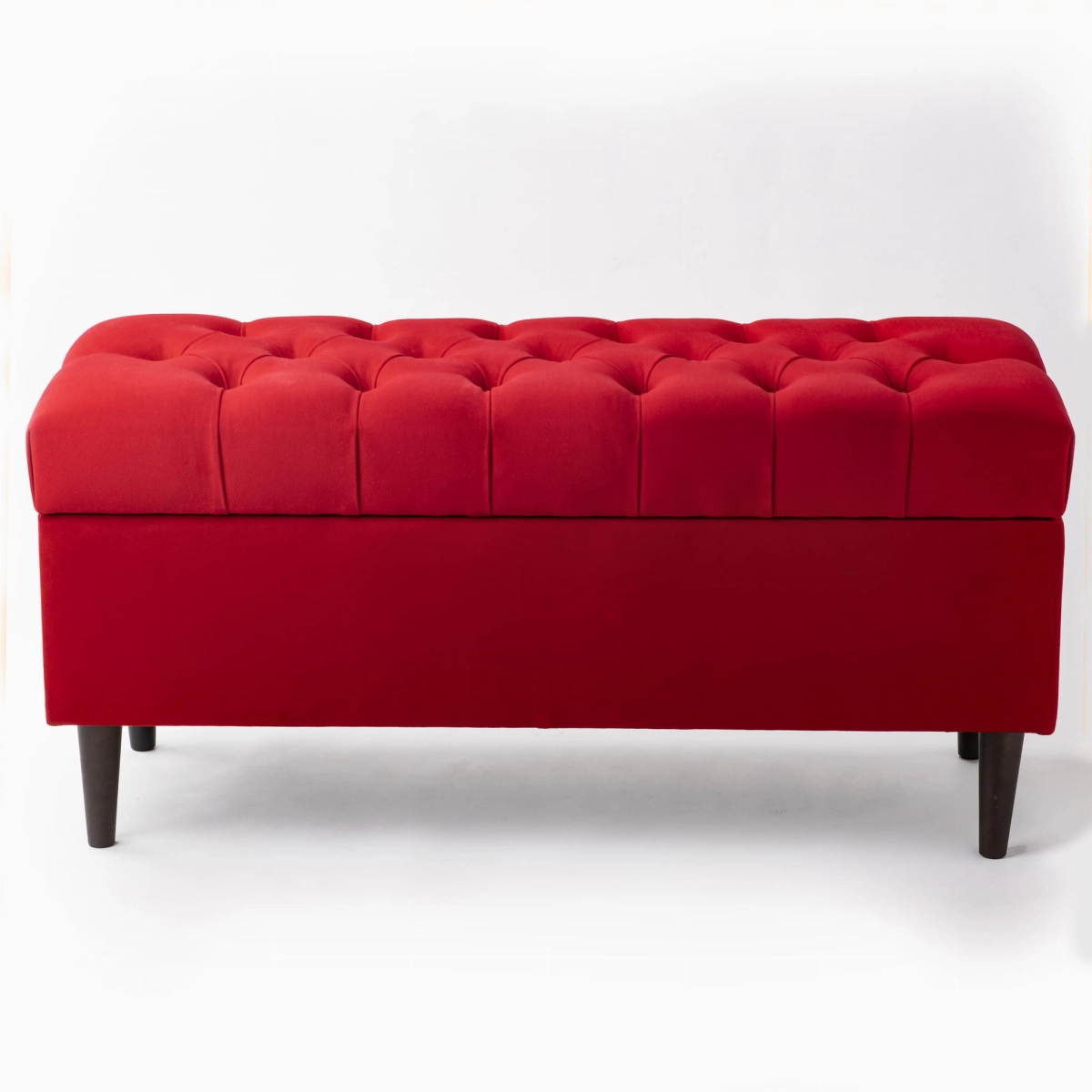 Quilted pouffe with storage in intense red, a comfortable and aesthetically pleasing solution