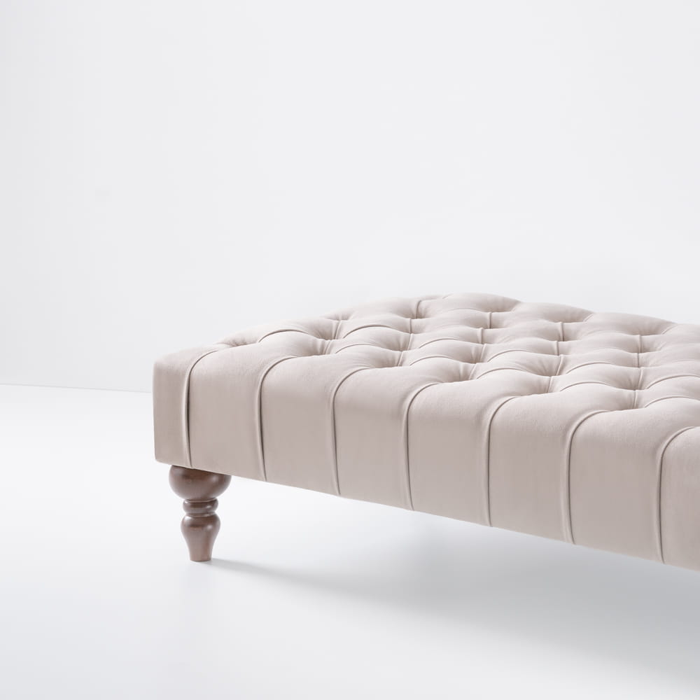 Latte coffee table with quilted upholstery, a stylish and practical piece of furniture