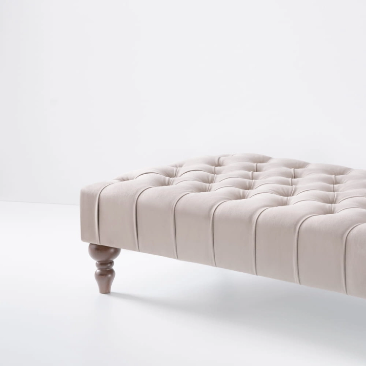 Latte coffee table with quilted upholstery, a stylish and practical piece of furniture