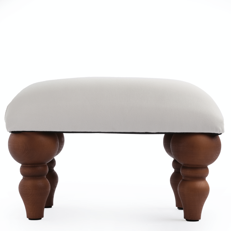 Armchair footrest in white, a practical and aesthetically pleasing piece of furniture