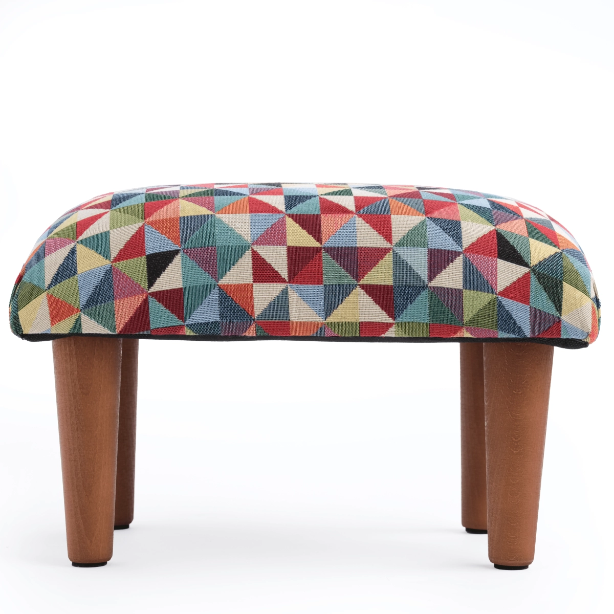 Armchair footrest with geometric patterned upholstery