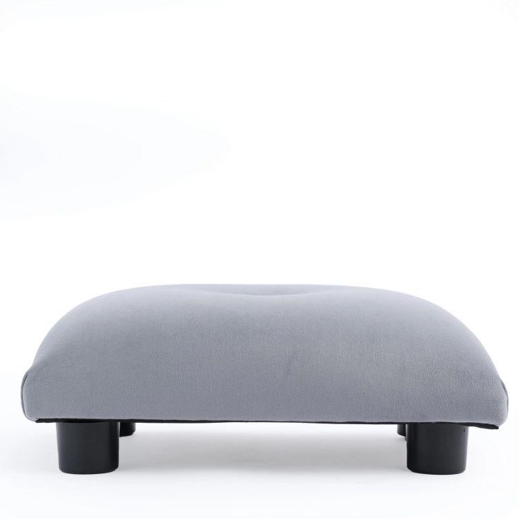 Quilted footstool in grey, a comfortable and decorative piece of furniture