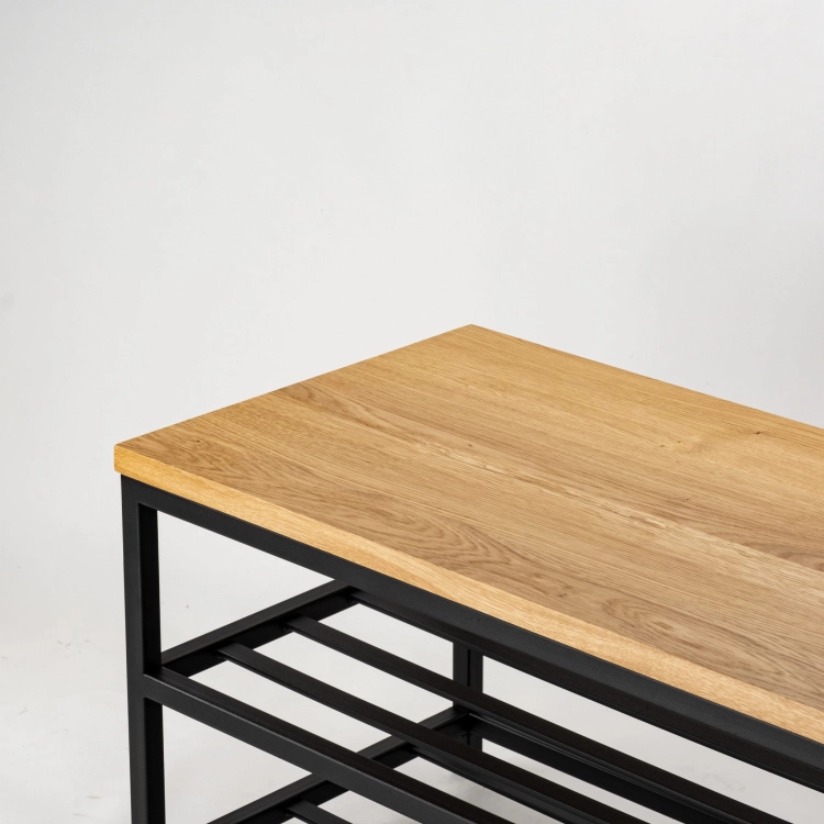 Industrial bench with wooden top and functional shelves below