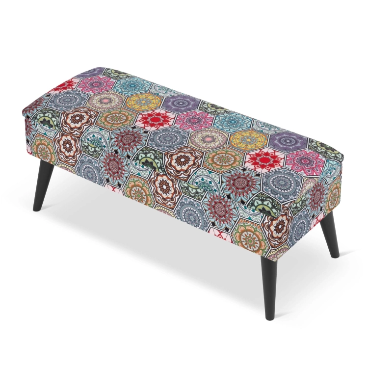 patterned upholstered storage pouffe with black legs