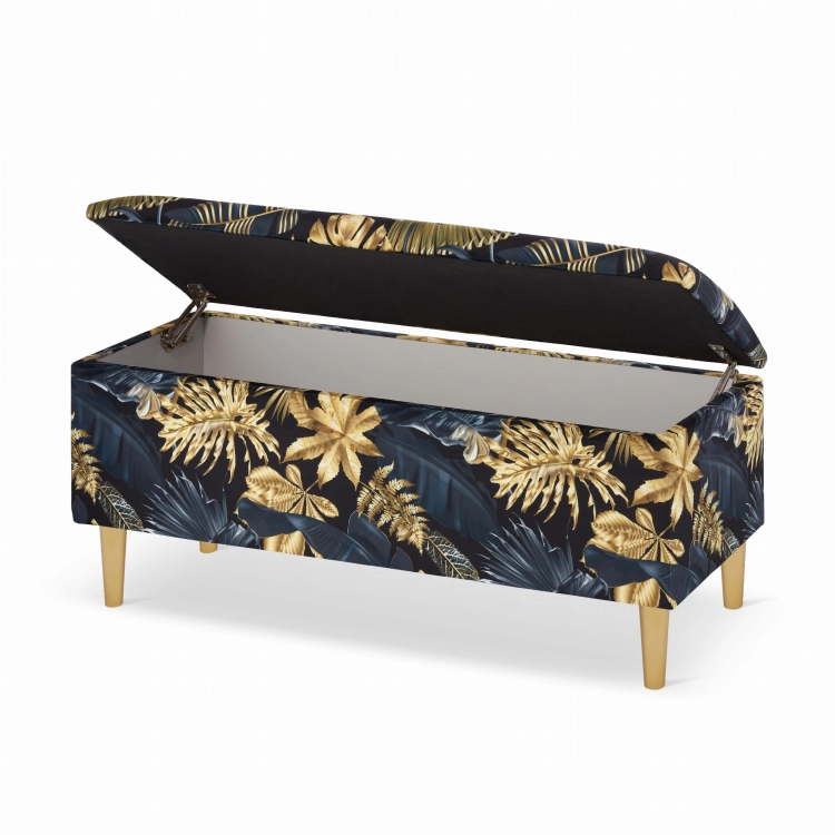 black pouffe with storage in gold leaves