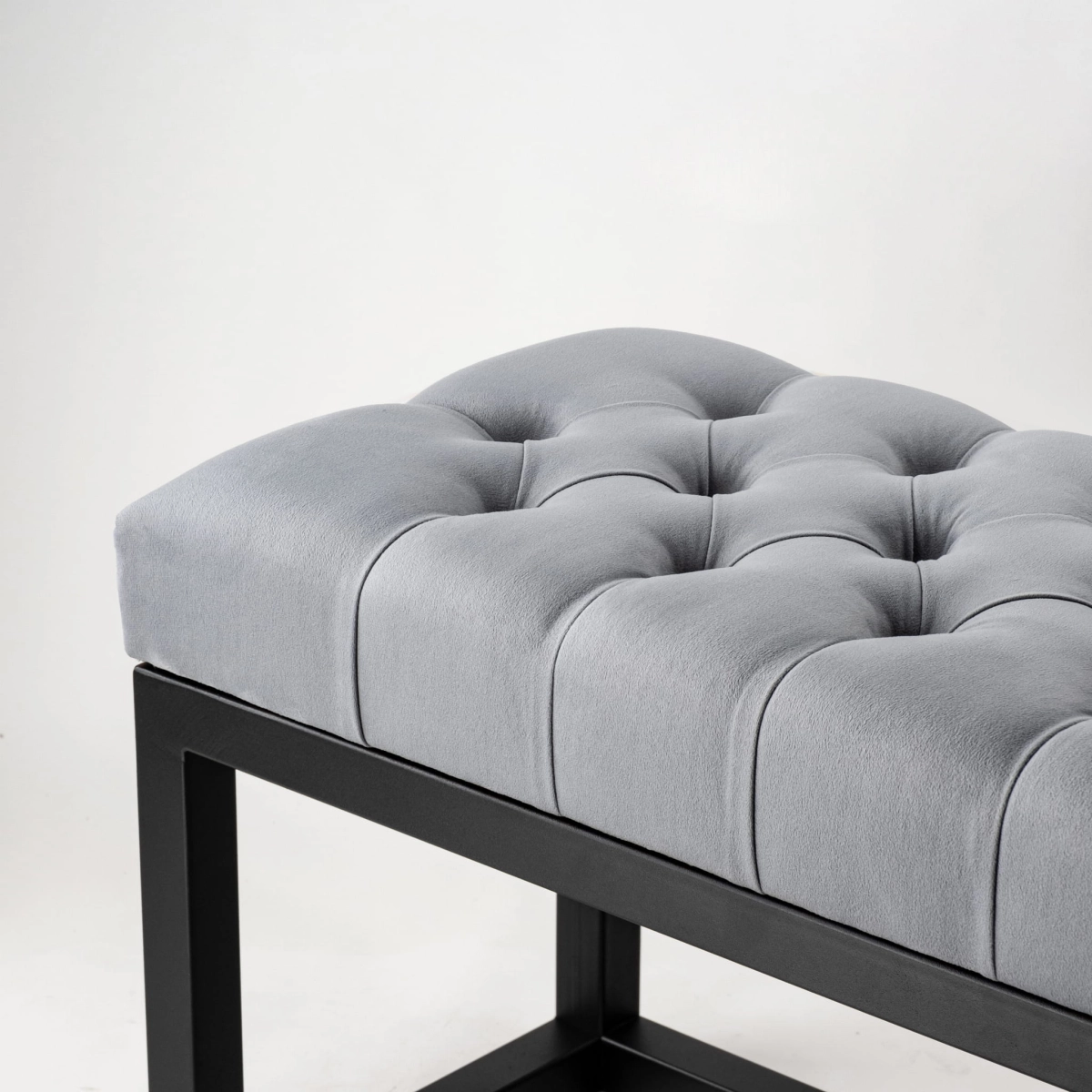 Industrial quilted bench on a metal frame