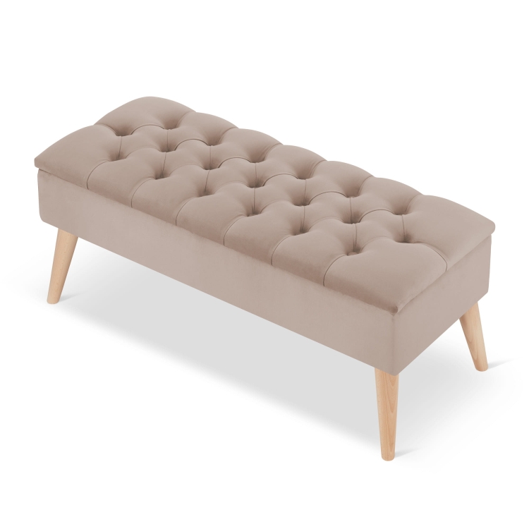 Stylish quilted pouffe in latte with storage, a practical piece of furniture for the interior