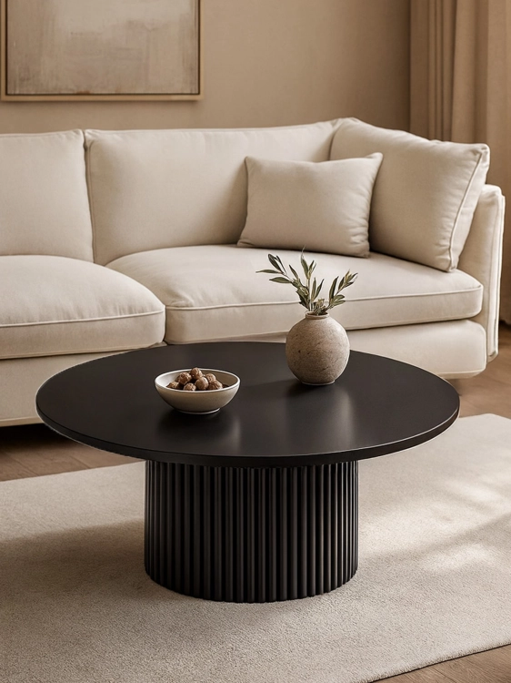 black coffee table with grooved base
