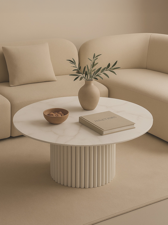 White round table with a stone top and an original grooved base