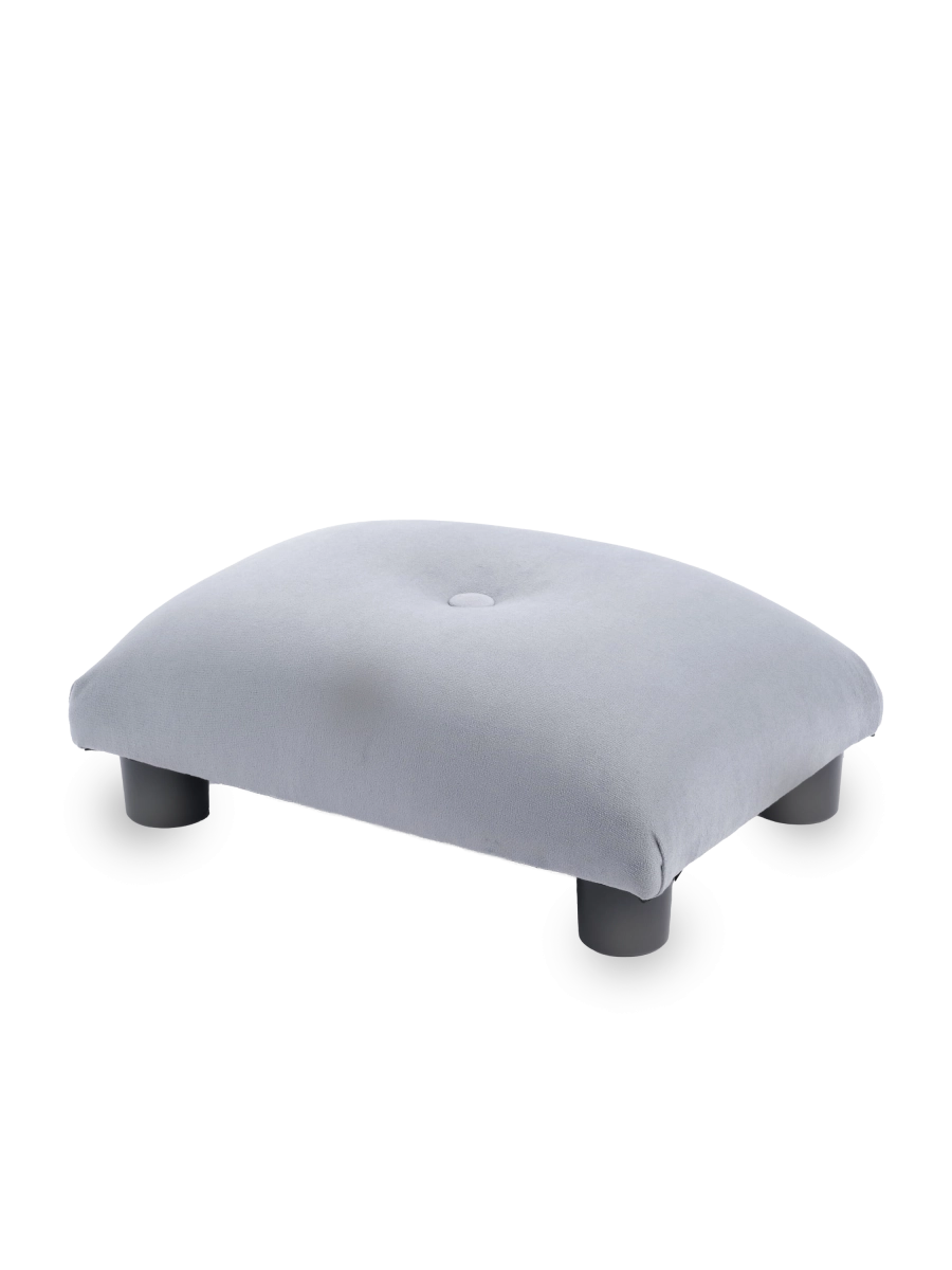 Quilted footstool in grey, a comfortable and decorative piece of furniture