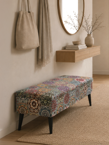 patterned upholstered storage pouffe with black legs