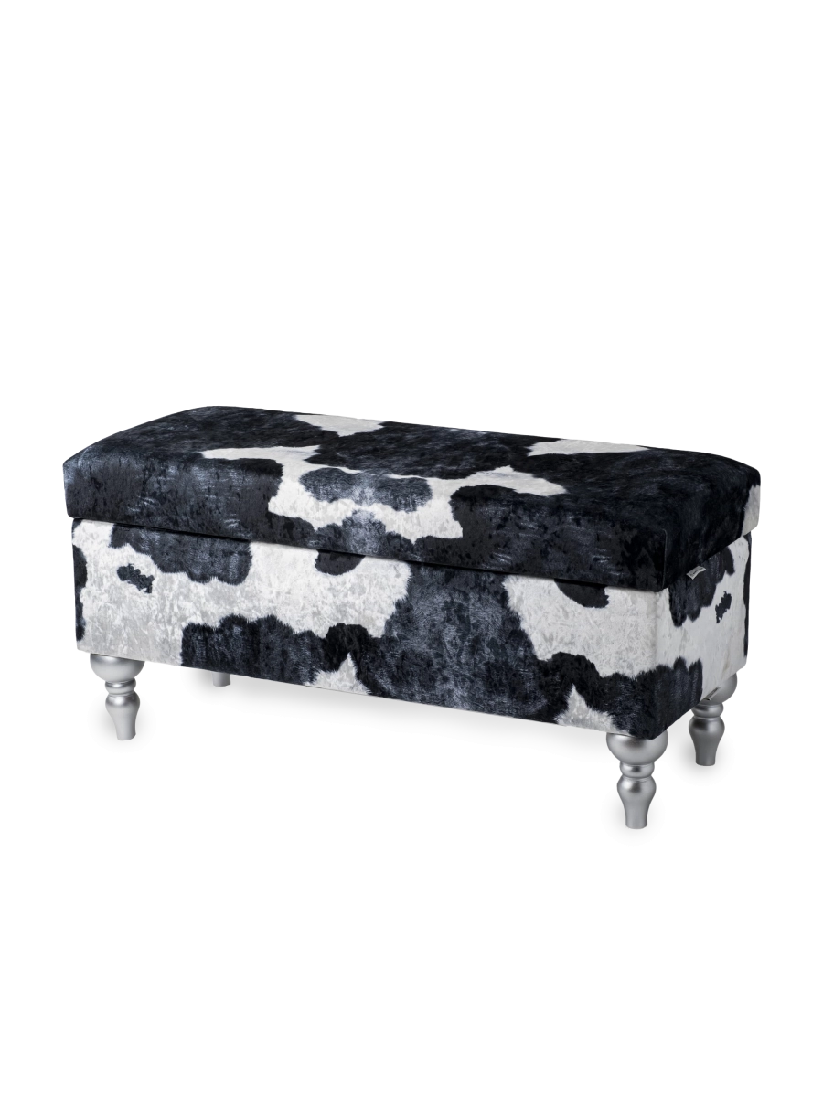 Storage pouffe with cow pattern upholstery, comfortable and decorative for the interior