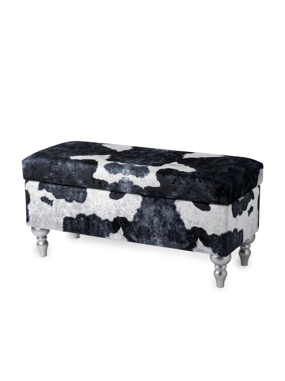 Storage pouffe with cow pattern upholstery, comfortable and decorative for the interior