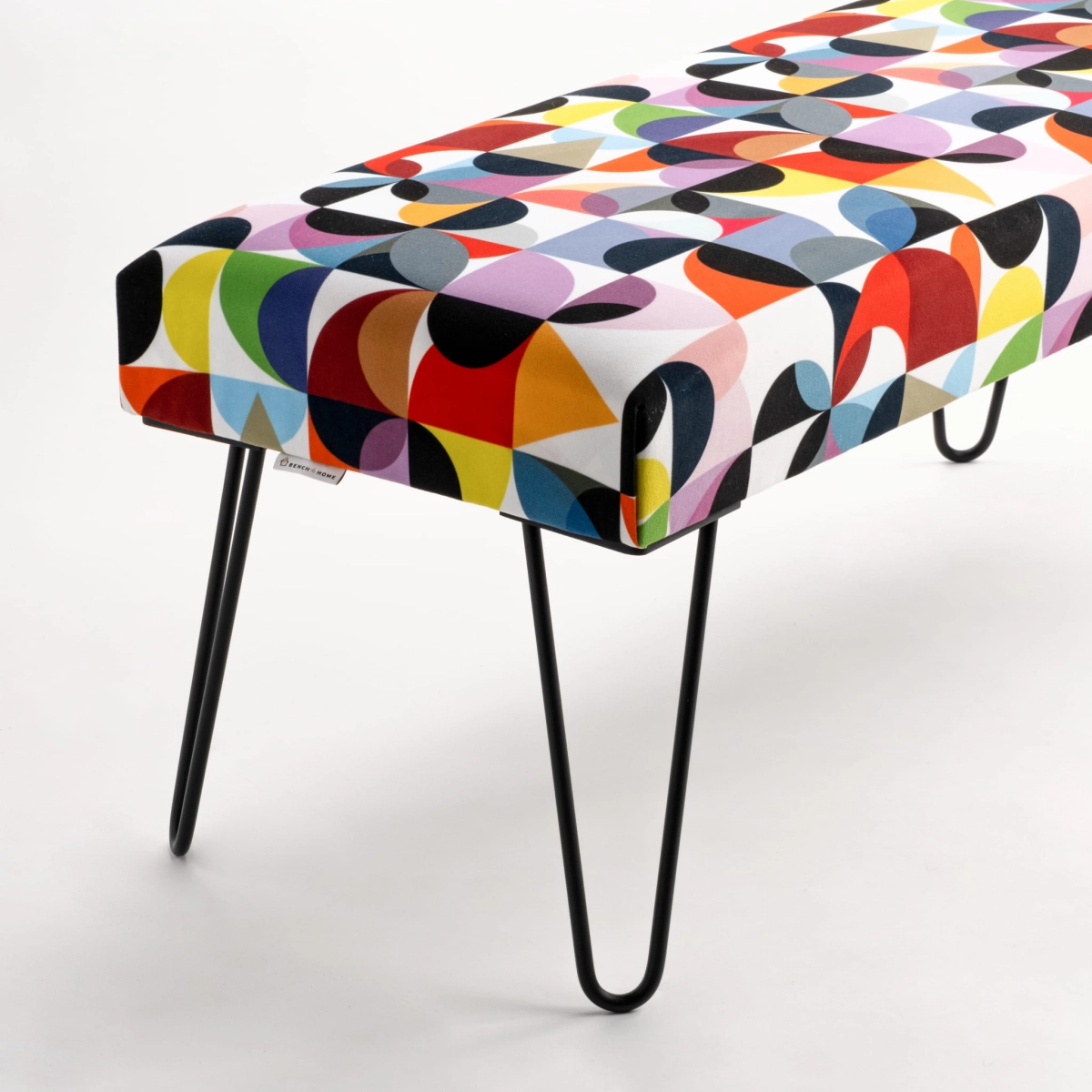 Patterned bench on metal legs