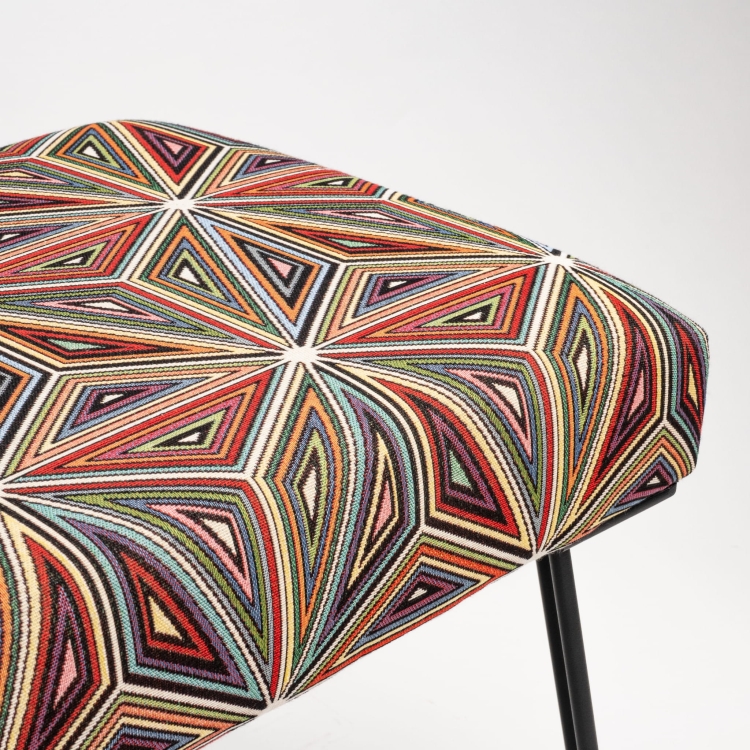 Patterned bench on metal legs