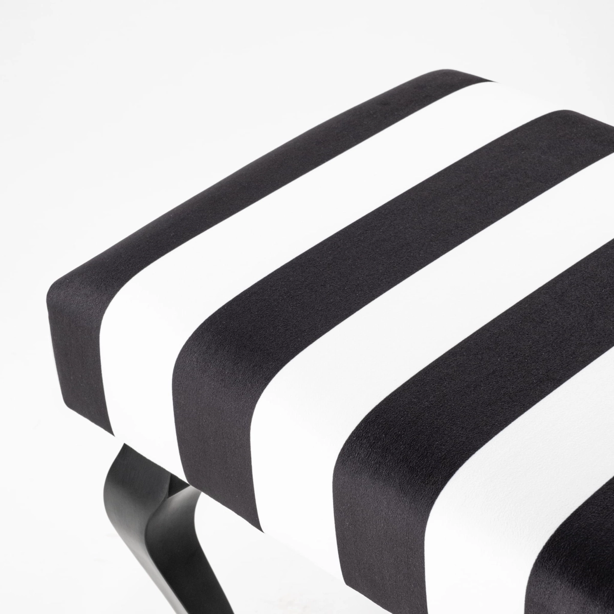 Black and white stripes on the bench