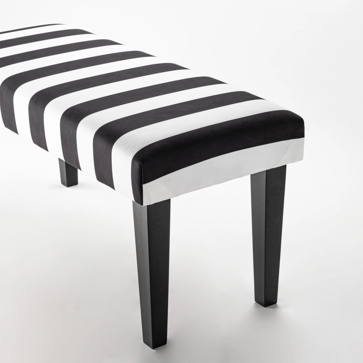 Black and white striped bench with black legs