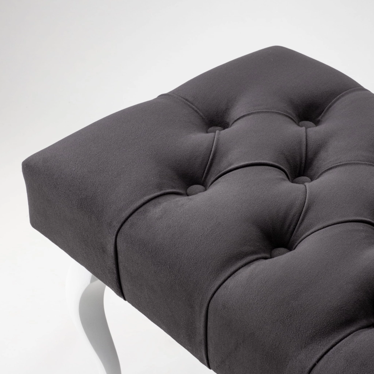Quilted anthracite bench with white legs