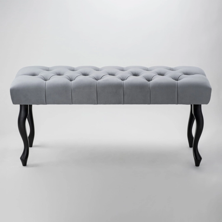 gray quilted bench with black legs elegant and functional piece of furniture for the hallway