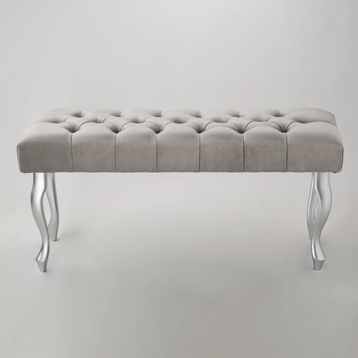 Gray upholstered bench with silver legs - a modern and elegant piece of furniture for the living room or hallway