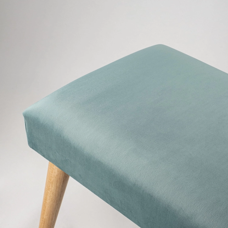 Elegant mint upholstered bench with wooden legs