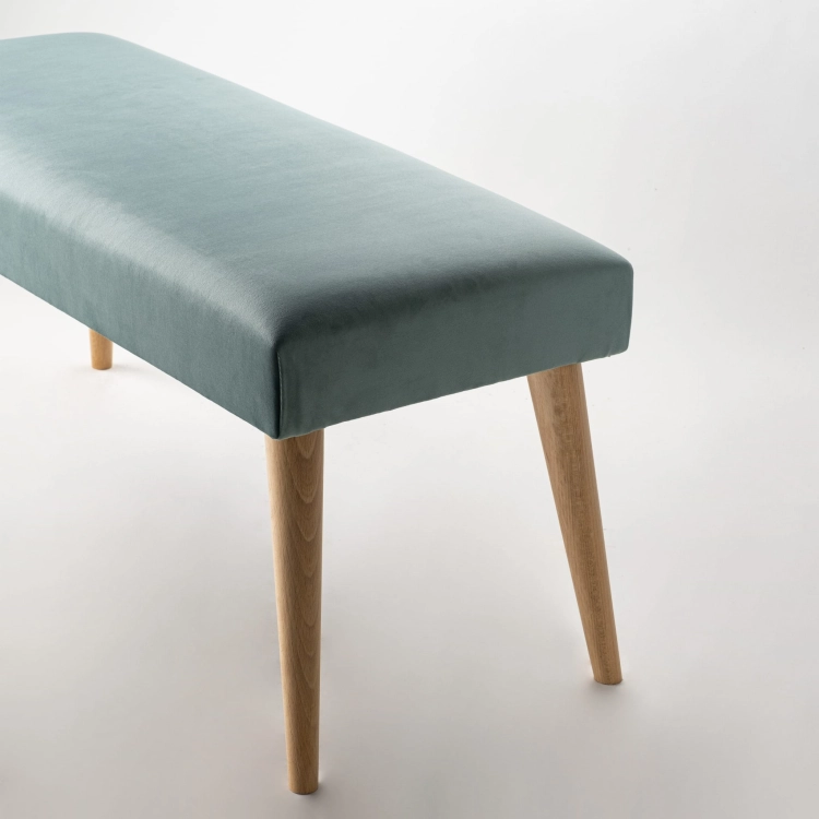 Stylish mint-colored bench with upholstery and wooden base, perfect for a living room or hallway