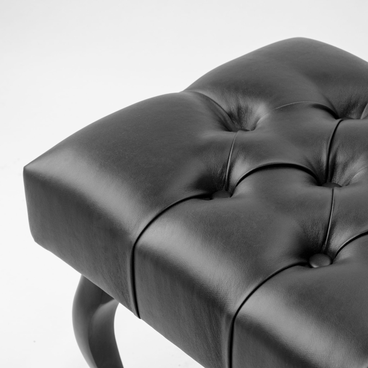 Elegant black quilted leather bench
