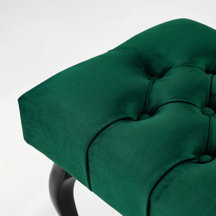 Bottle green quilted bench with black legs
