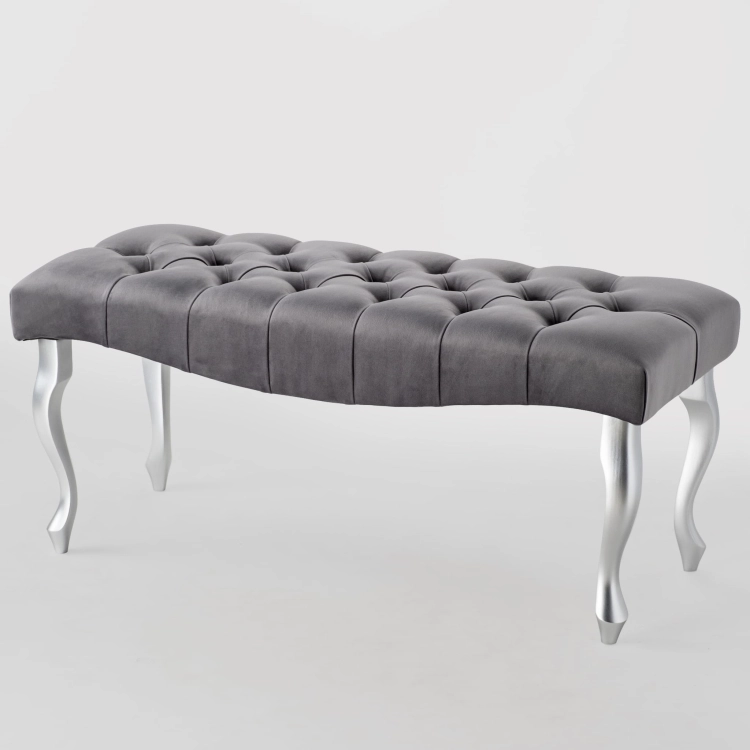 bench with quilted seat and white legs