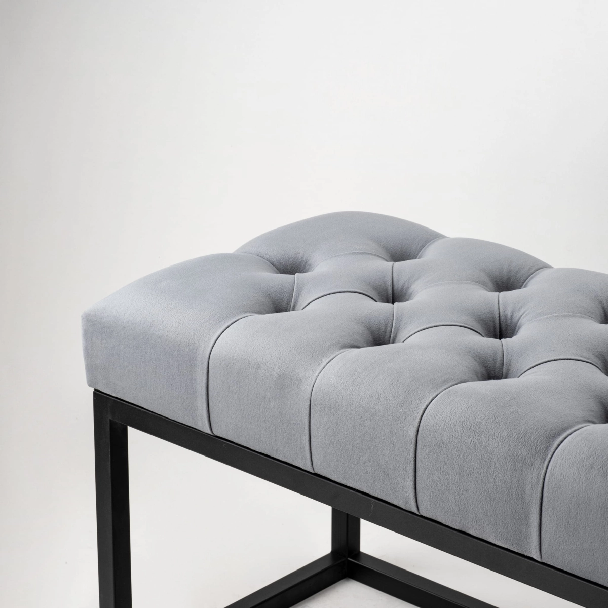 Industrial quilted bench on a metal frame