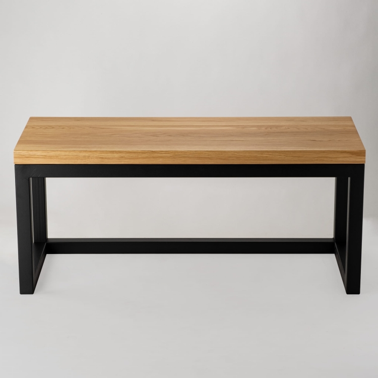 Bench with wooden top and metal frame in industrial style