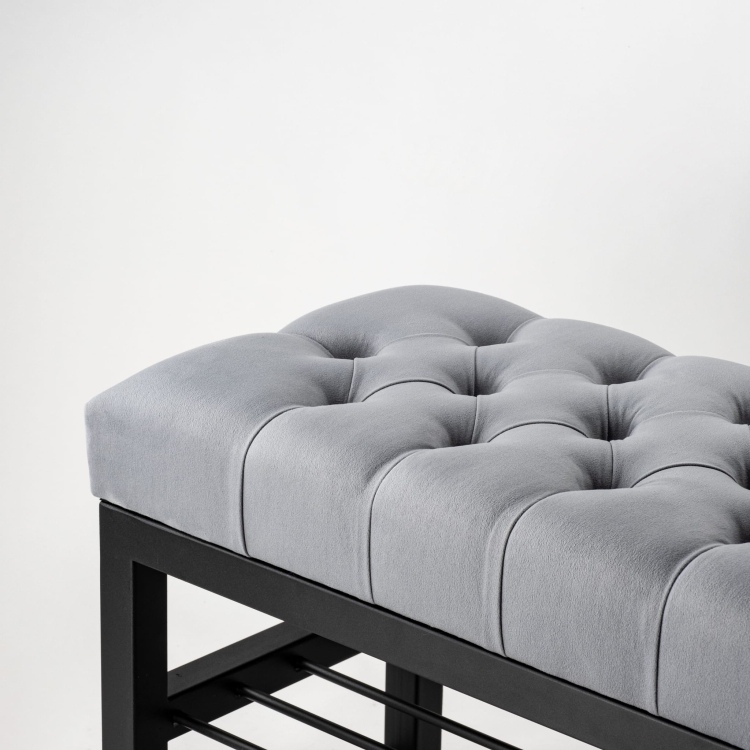 grey industrial quilted bench with metal shelves