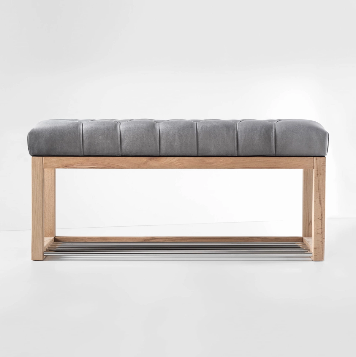 Bench with quilted seat in grey and wooden structure