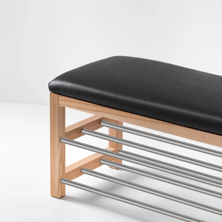 Modern hallway bench with black seat, wooden frame and metal shoe shelf