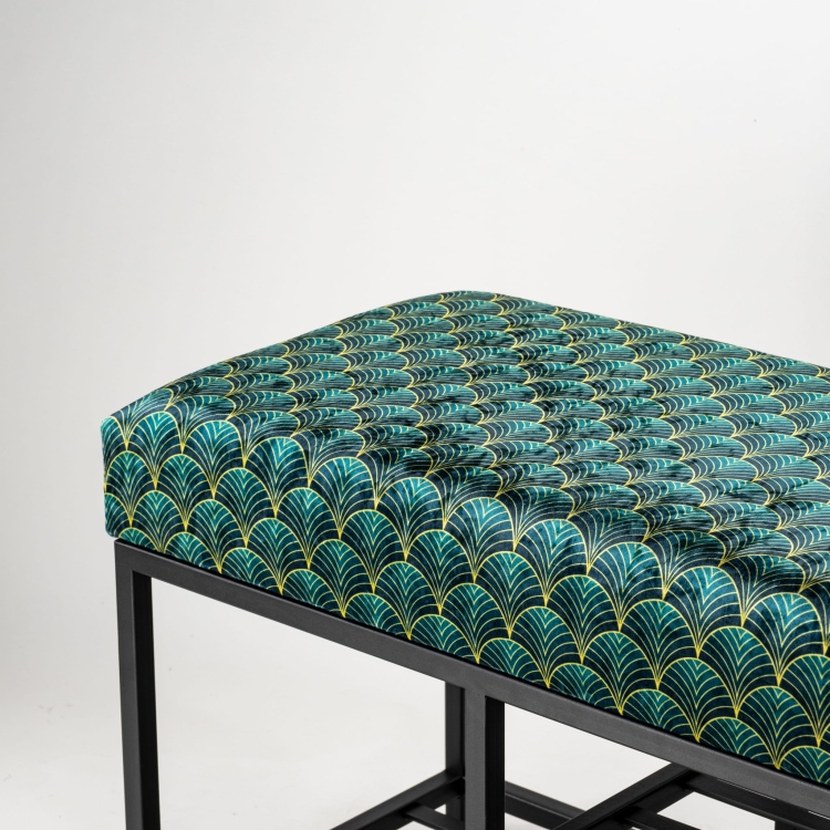 Upholstered loft-style bench on a metal base