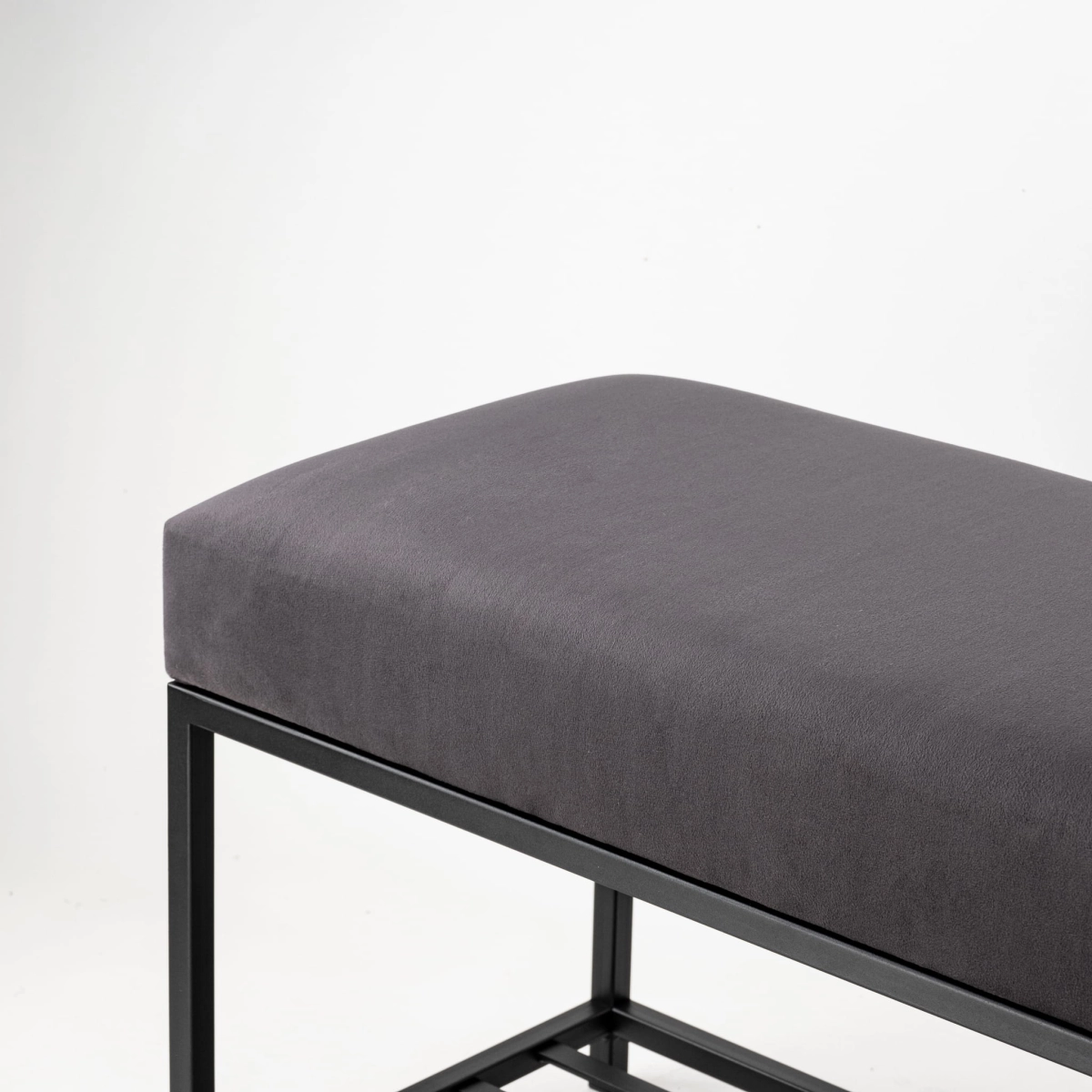 Upholstered bench in graphite with metal frame
