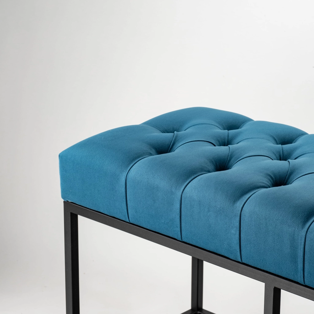 Quilted blue bench for industrial interiors
