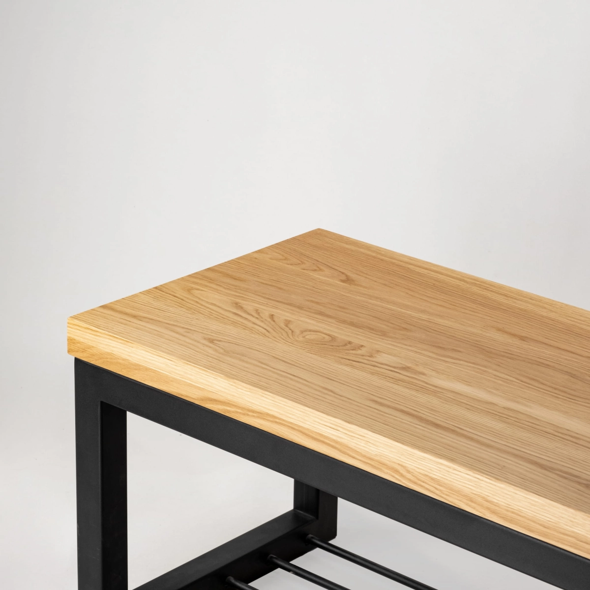 Metal bench with shoe shelf and wooden top, ideal for loft interiors